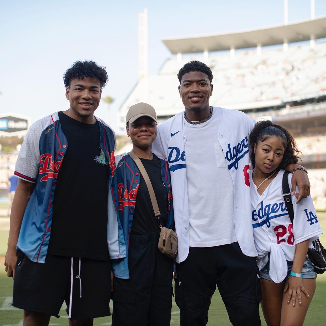 Rui Hachimura at a baseball game with the LA Dodgers, surrounded by family joy to welcome Shohei Ohtani