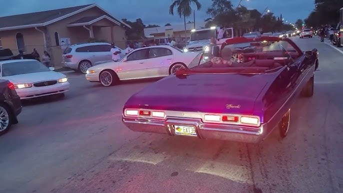 Rick Ross shows off his unique purple supercar at the auto show. WoWwwwwwwwwwwwwww!