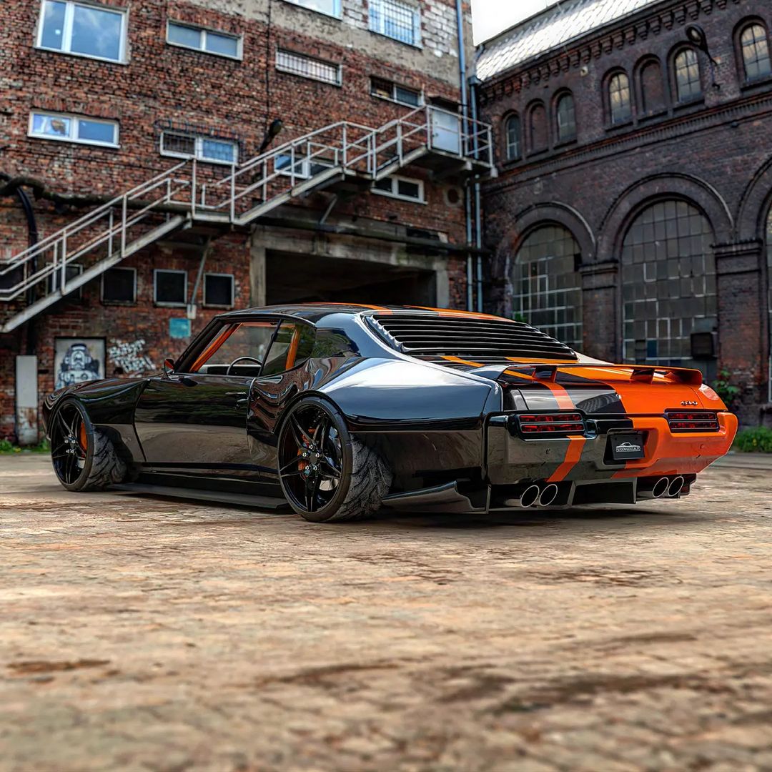 Close-Up of the Curvaceous Orange/Black Double-Sided Pontiac GTO Mustang, Flaunting its Powerful Muscular Presence – Supper Stories